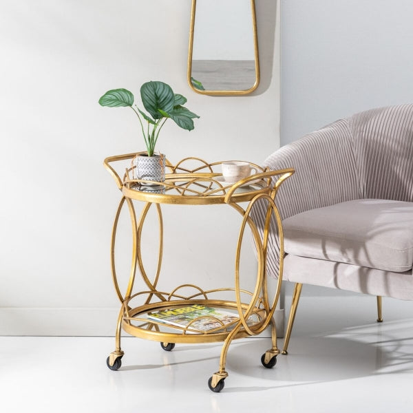 Carrito contemporáneo en metal dorado y vidrio para decoración del hogar