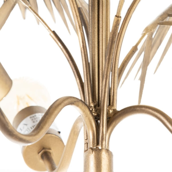Lámpara de pie con diseño de palmera en metal dorado - Ilumina tu interior con un toque exótico