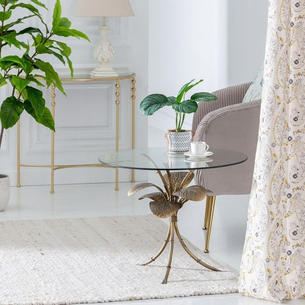 Mesa auxiliar contemporánea con diseño de hojas tropicales doradas para decoración del hogar en vidrio y metal dorado